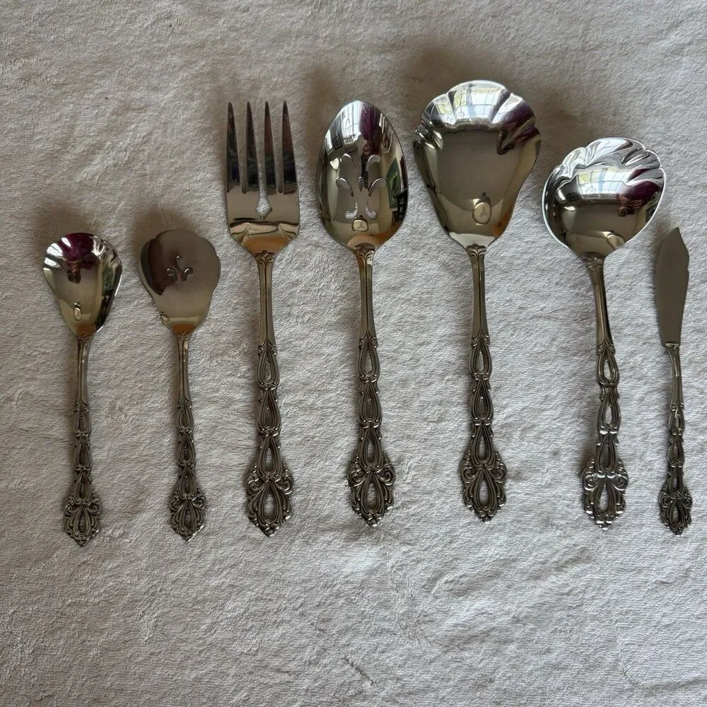 Vintage 7-piece Oneida Community Chandelier serving utensil set in stainless MCM